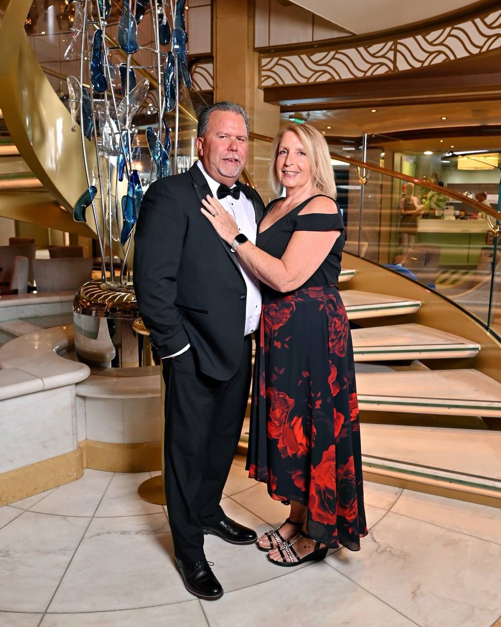 Professional couple portrait in formal attire by the grand staircase