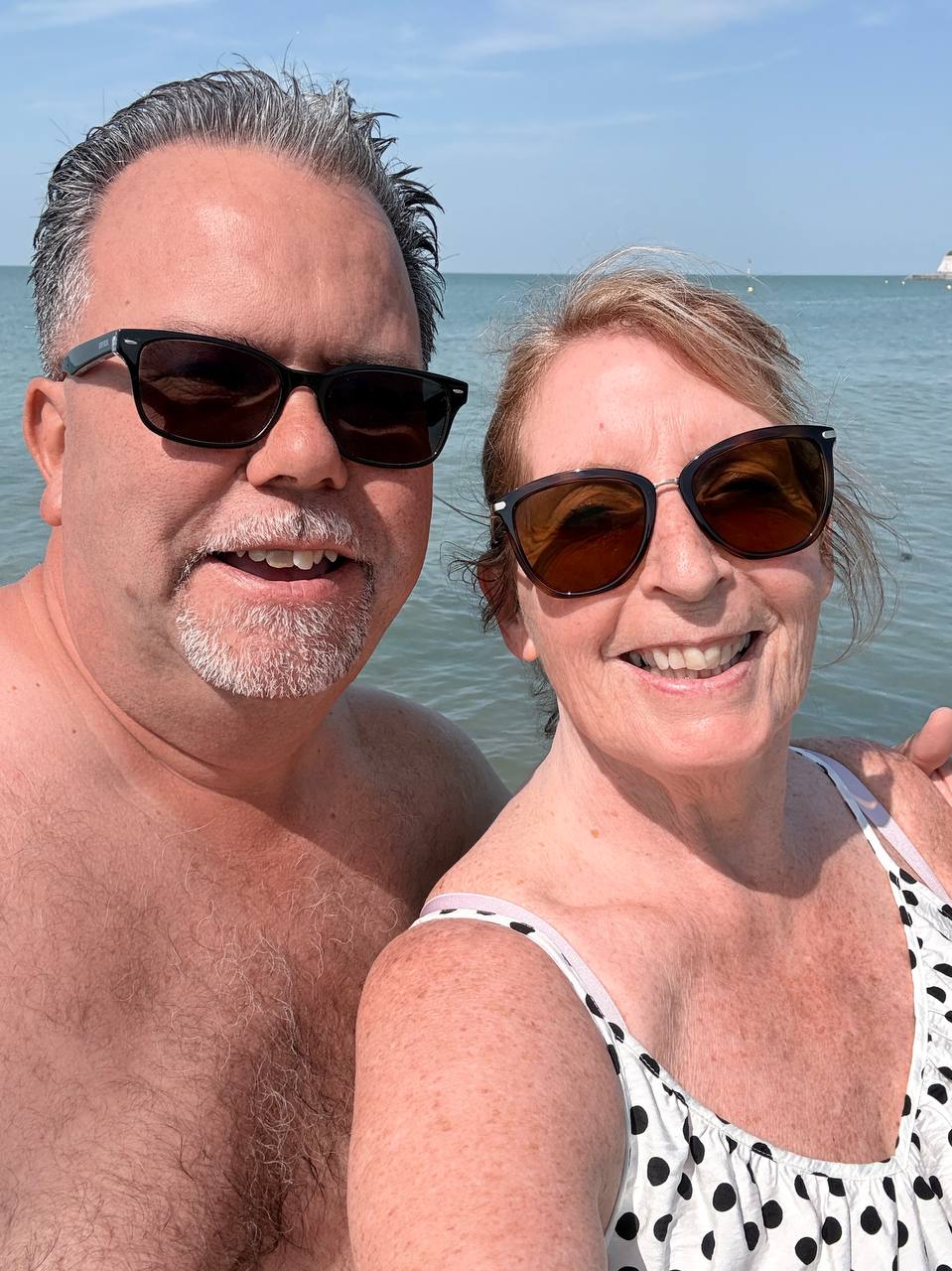 Angie and Iain smiling in the sea at Westgate-on-Sea