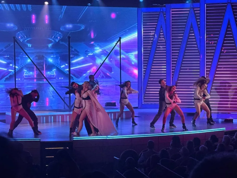 Main show - dancers on stage with emoji backdrop